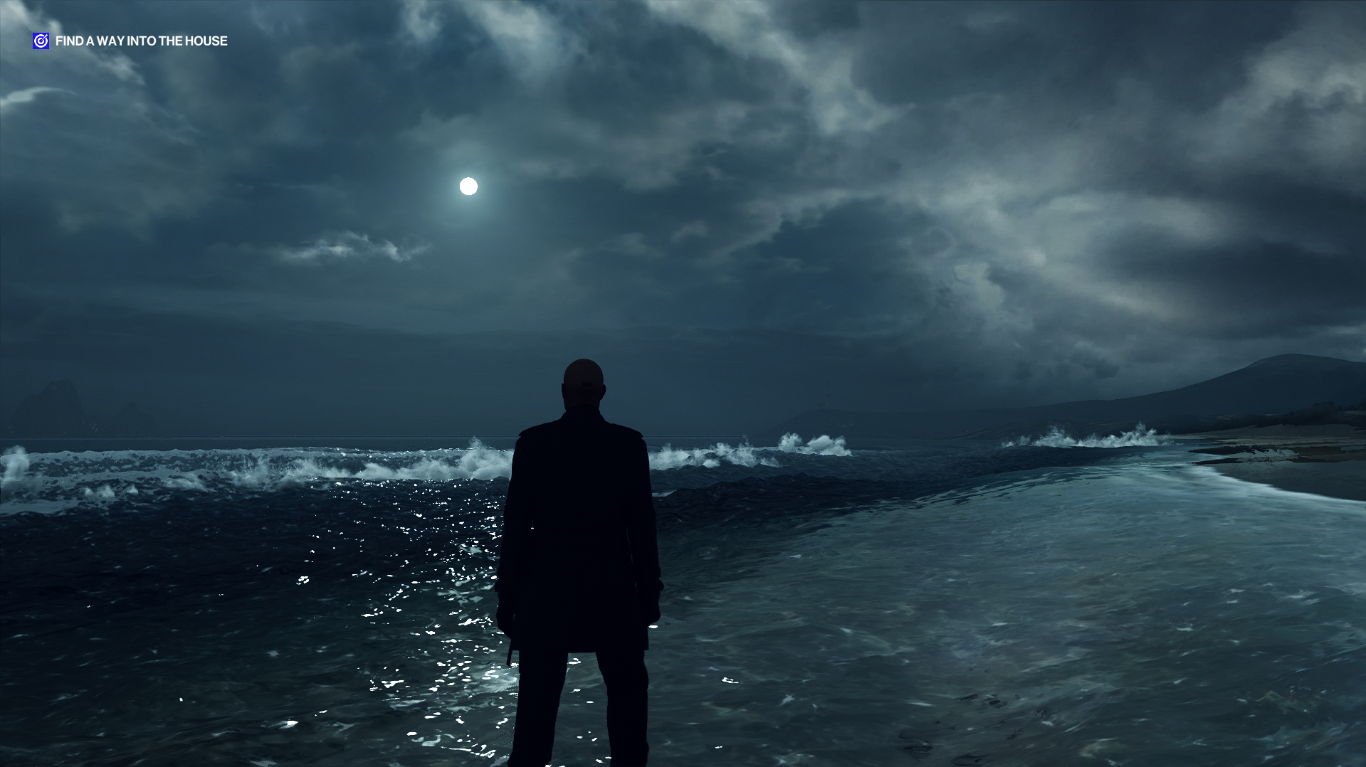 (Hitman 3) This is already mostly a walking game, why not walk some more? Standing in the waves at a cold, cold beach.